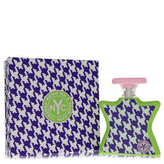 Perfume bottle and packaging with houndstooth pattern and 'NYC' branding on a white background