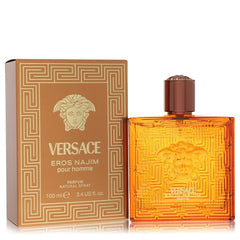 Versace Eros Najim pour homme perfume bottle and its packaging box, both in a warm amber-brown color with gold geometric patterns and the iconic Medusa head logo.