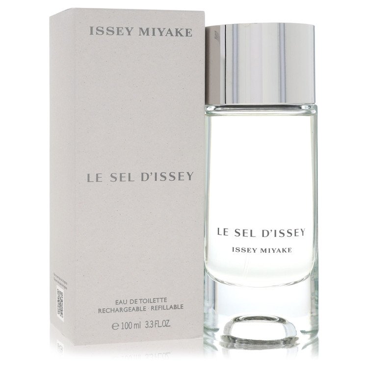 Issey Miyake Le Sel D'Issey refillable eau de toilette spray bottle with a reflective silver cap next to its light gray packaging box.