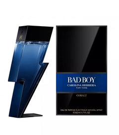 Carolina Herrera Bad Boy Cobalt Eau de Parfum, featuring a dark blue lightning-bolt shaped bottle next to its black and blue retail box.