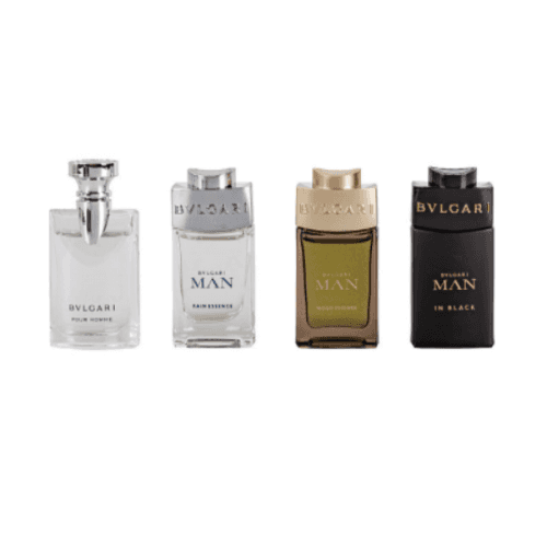 Four Bvlgari Men perfume bottles arranged in a row against a plain white background. The bottles include Pollice Verso, Impression, Nobile Scuro, and In Black, showing different glass finishes and colors.