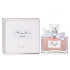 Miss Dior parfum bottle with packaging on a white background